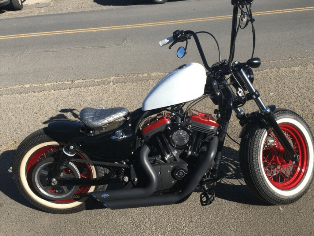 Maui Custom Harley Davidson Motorcycle with powder coated spoked rims using Lollypop Red by Prismatic Powders. Photo by Donovan Moleta.